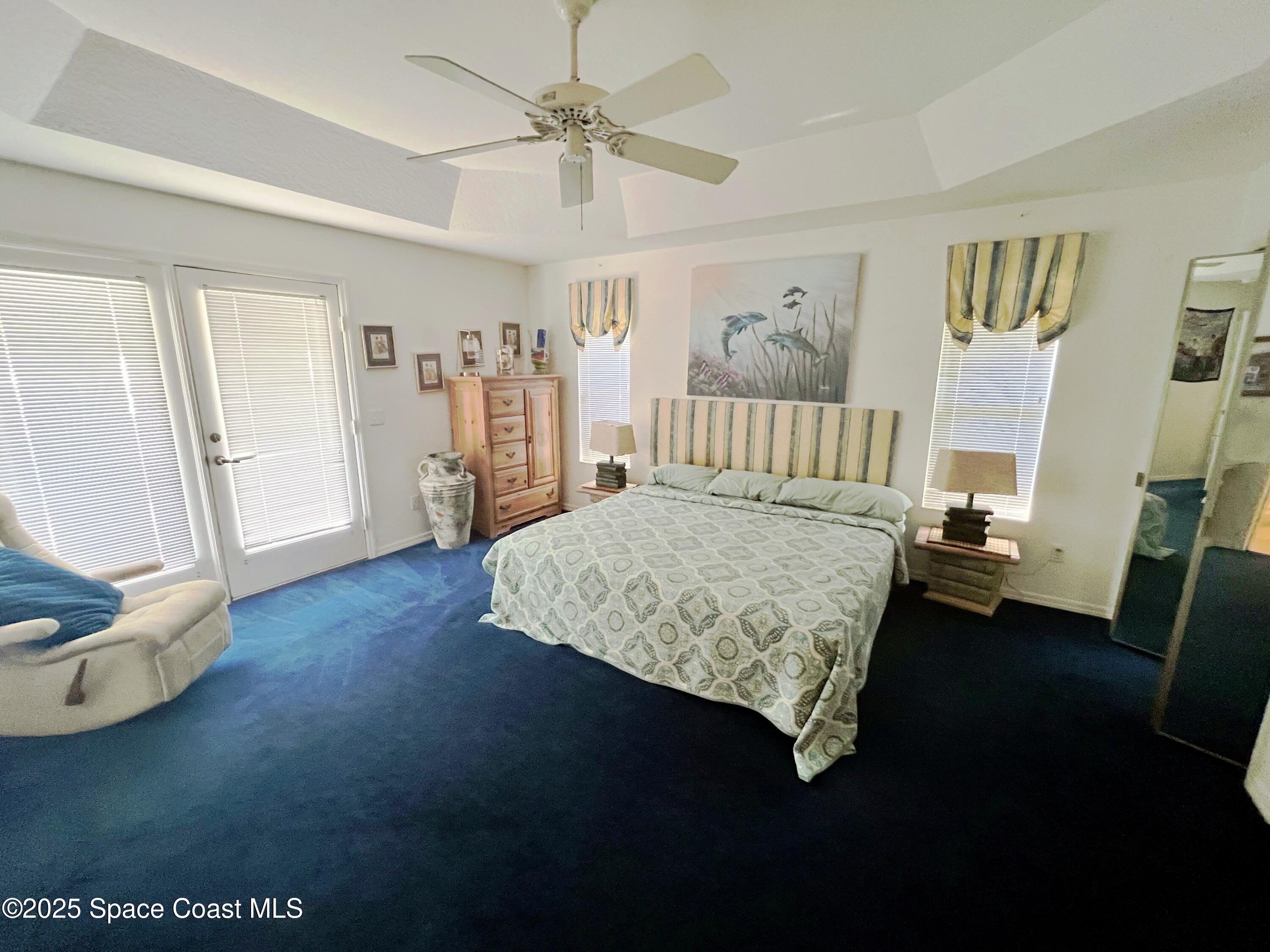 150 Sandy Shoes Drive Melbourne Beach, FL 32951 - Photo 24 of 31 a room with a bed furniture and a window