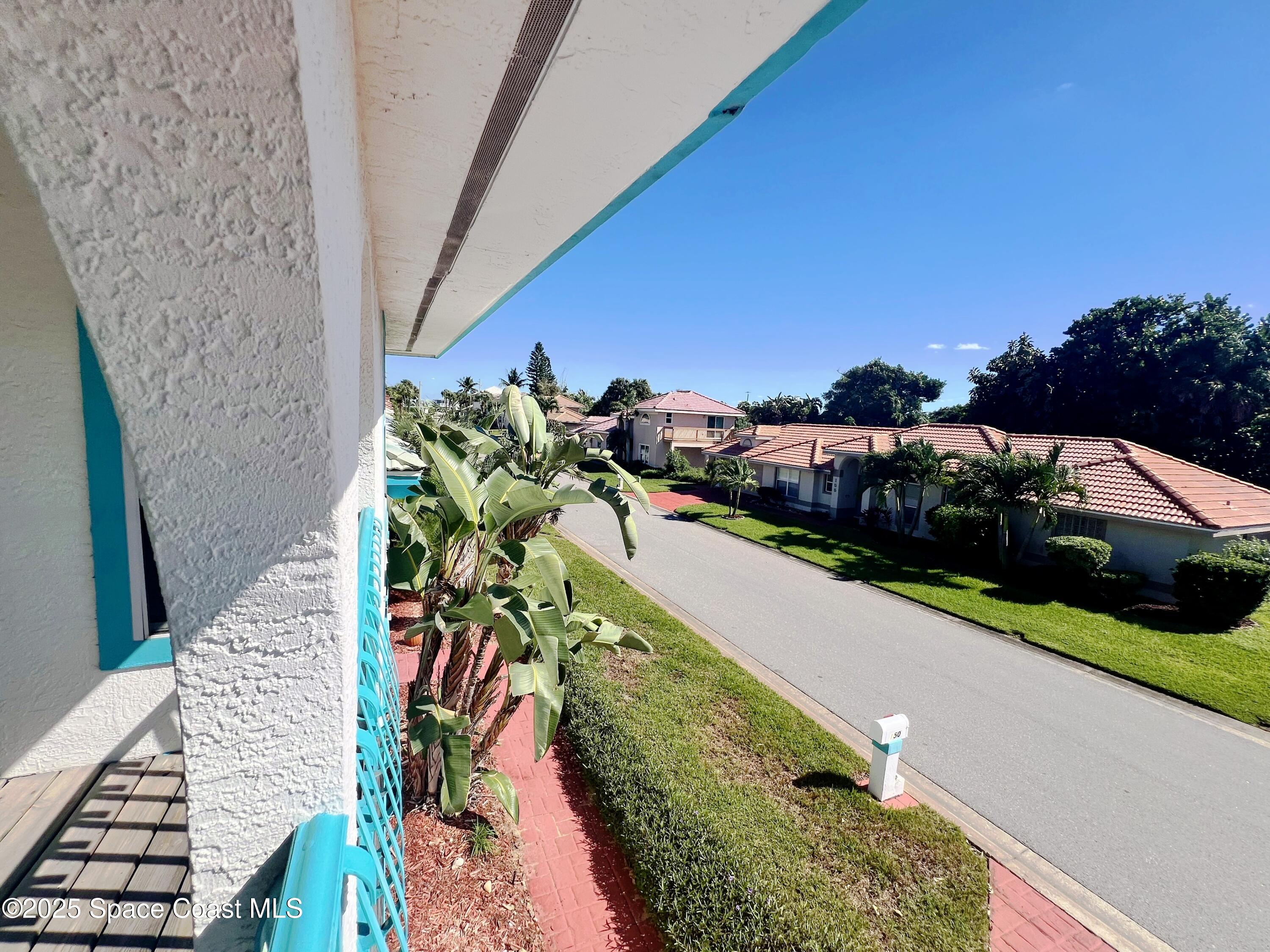 150 Sandy Shoes Drive Melbourne Beach, FL 32951 - Photo 26 of 31 a view of a yard with an outdoor seating