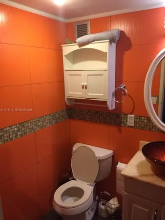 a bathroom with a sink and a shower