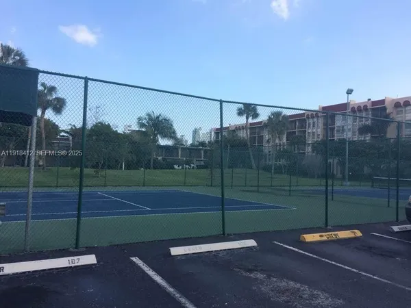 a view of a building with a park