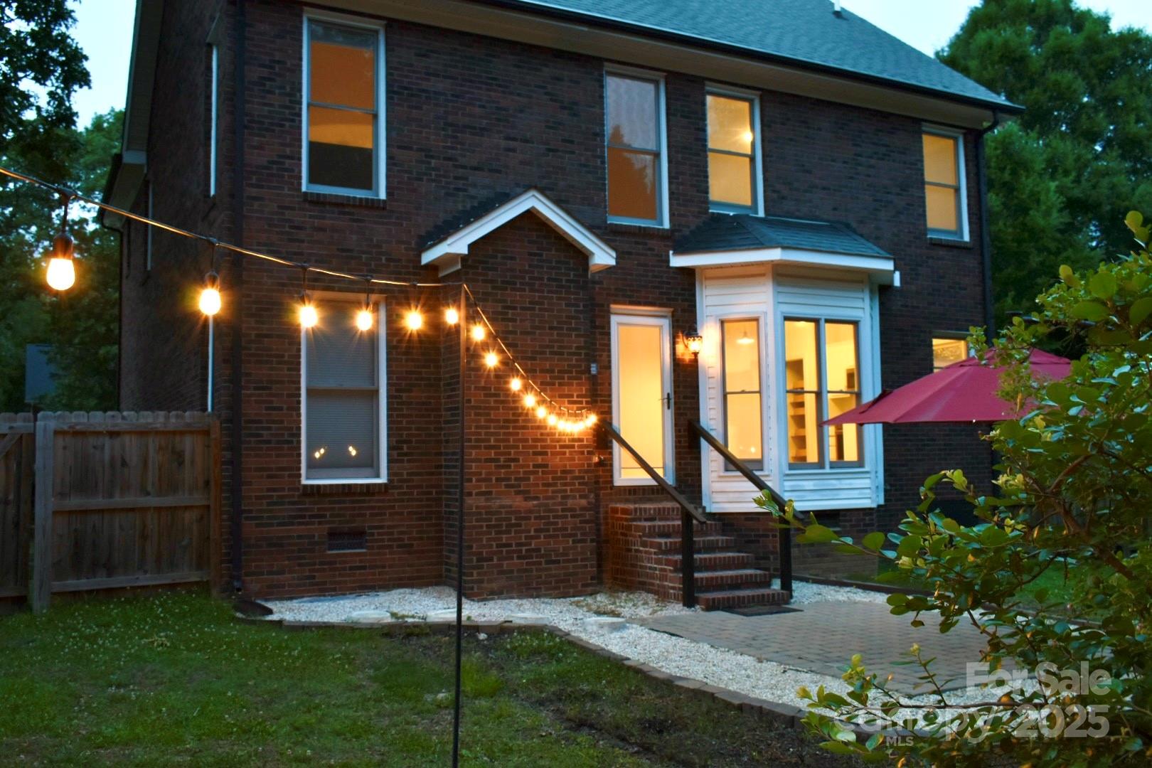 1120 Millwright Lane Matthews, NC 28104 - Photo 32 of 41 a front view of a house with a yard
