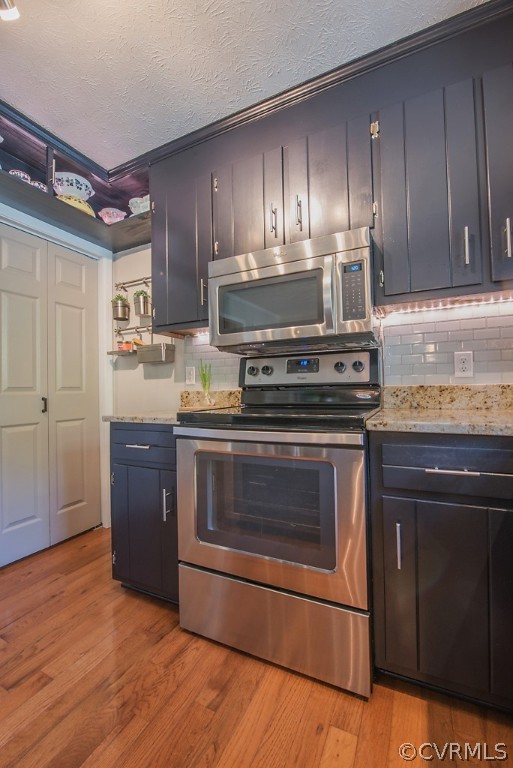 1532 Austin Road Chester, VA 23836 - Photo 16 of 50 a kitchen with a stove and a microwave
