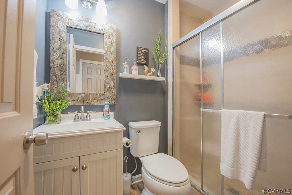 1532 Austin Road Chester, VA 23836 - Photo 22 of 50 a bathroom with a sink toilet and mirror