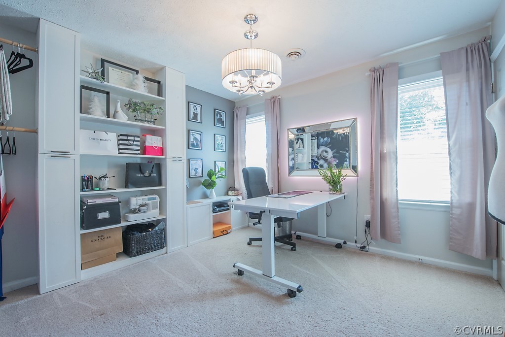 1532 Austin Road Chester, VA 23836 - Photo 36 of 50 a workspace with a chandelier
