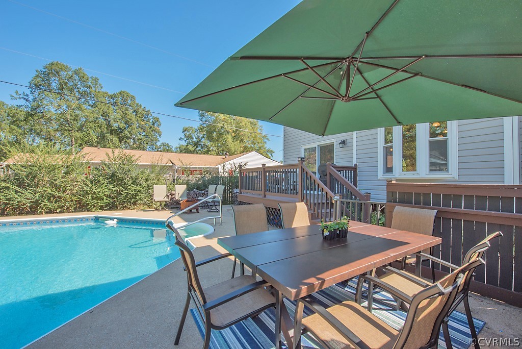 1532 Austin Road Chester, VA 23836 - Photo 42 of 50 a view of an outdoor space with furniture and umbrella