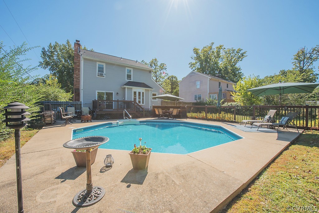 1532 Austin Road Chester, VA 23836 - Photo 44 of 50 a swimming pool with outdoor seating and yard