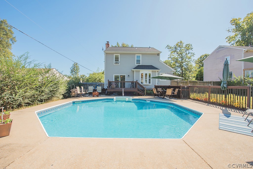 1532 Austin Road Chester, VA 23836 - Photo 45 of 50 a view of a swimming pool with a lounge chairs