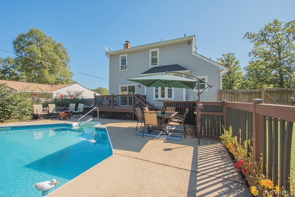 1532 Austin Road Chester, VA 23836 - Photo 46 of 50 a patio with table and chairs