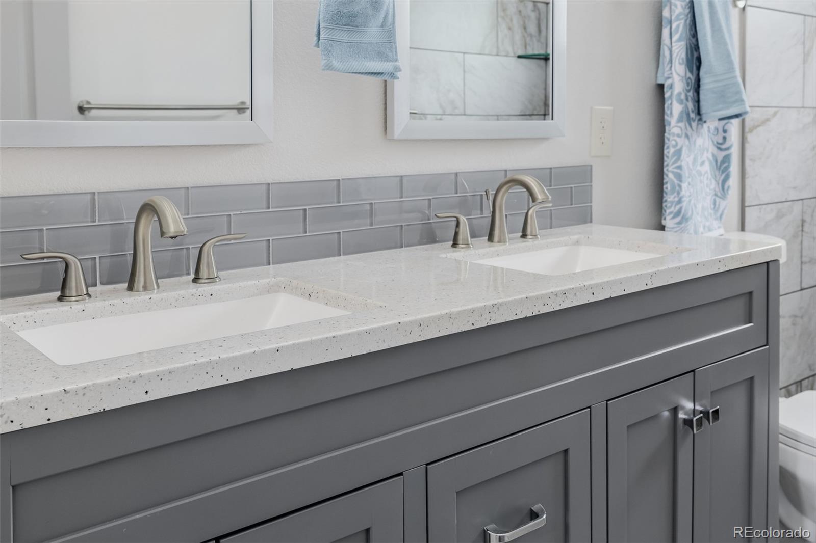 407 Double Tree Drive Greeley, CO 80634 - Photo 20 of 50 a close view of sink and cabinets