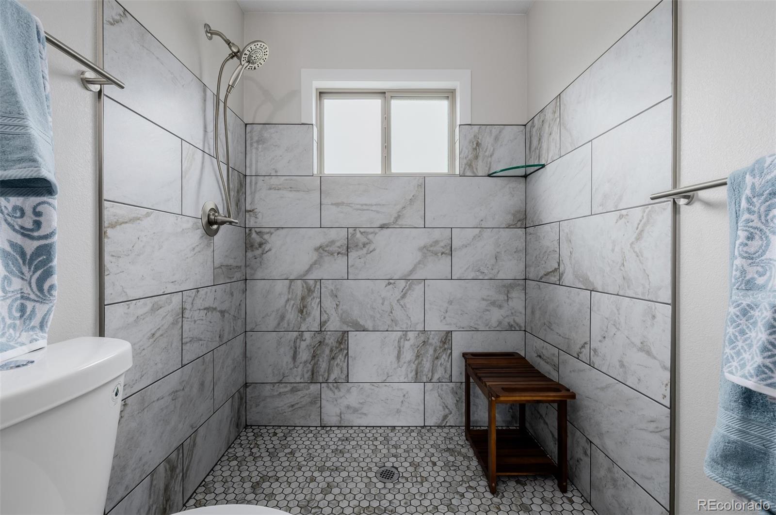 407 Double Tree Drive Greeley, CO 80634 - Photo 21 of 50 a bathroom with a sink and a toilet