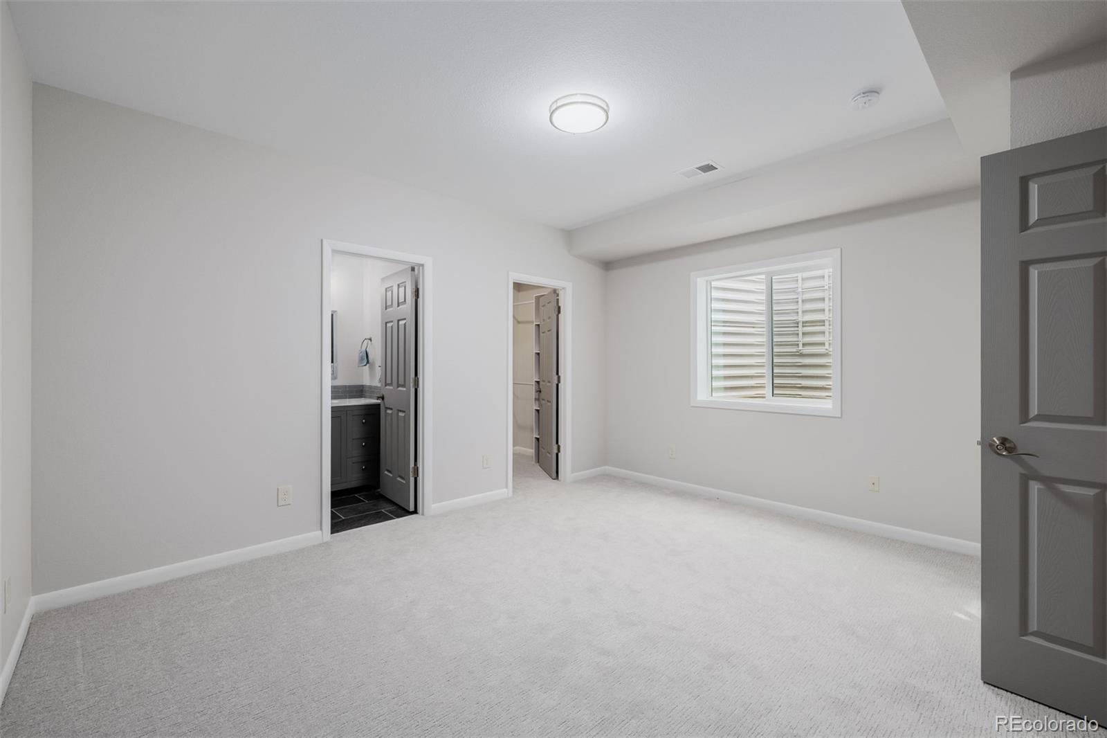 407 Double Tree Drive Greeley, CO 80634 - Photo 26 of 50 a view of an empty room with a window