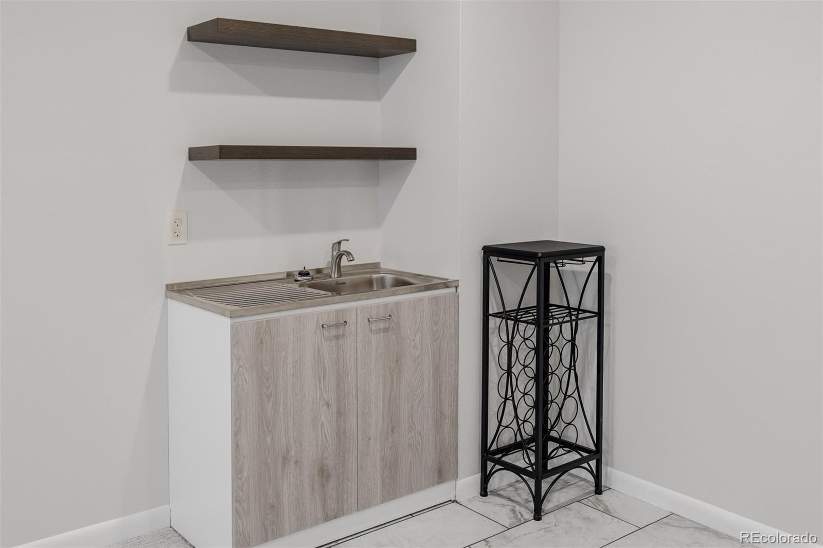 407 Double Tree Drive Greeley, CO 80634 - Photo 40 of 50 a room with storage and utility