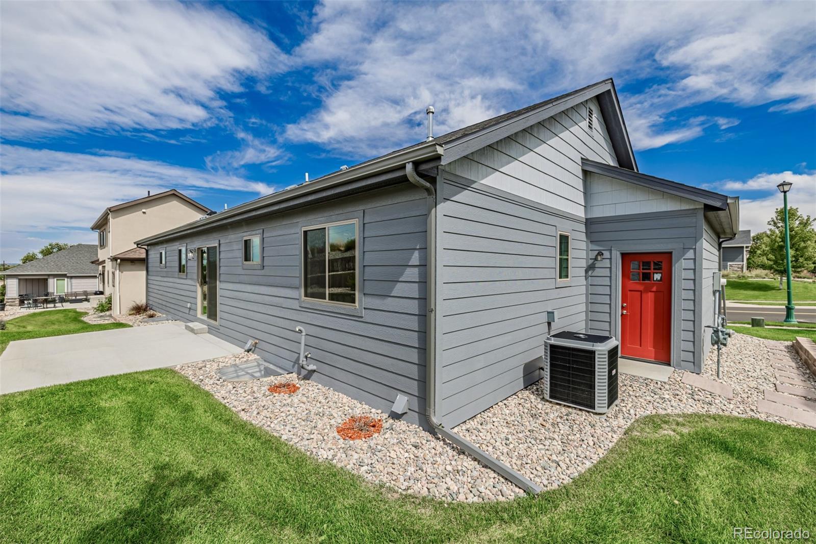 407 Double Tree Drive Greeley, CO 80634 - Photo 44 of 50 a front view of a house with a yard