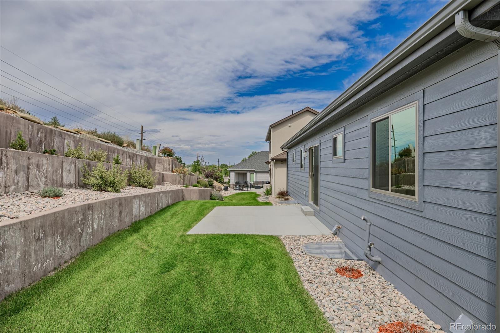 407 Double Tree Drive Greeley, CO 80634 - Photo 45 of 50 a view of a backyard with pathway