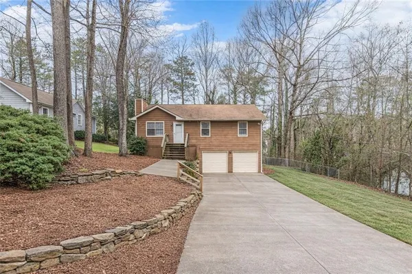 a house with trees in front of it