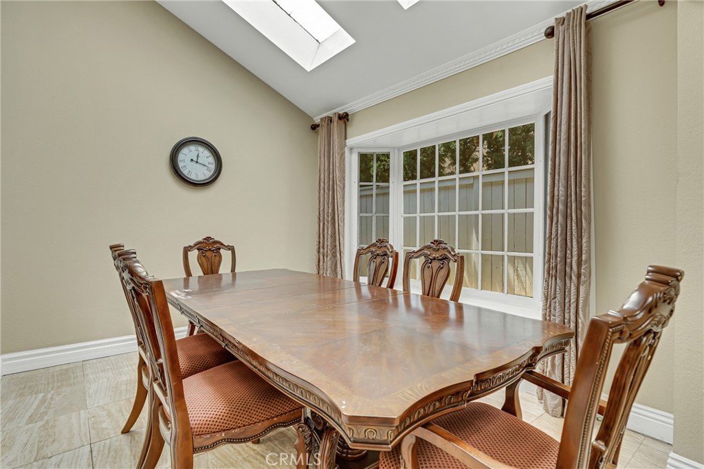 12 Oakdale Irvine, CA 92604 - Photo 12 of 53 a dining room with furniture and window