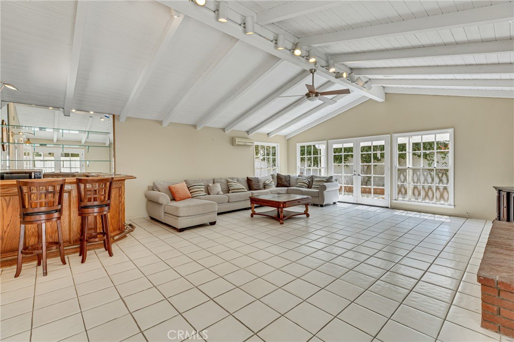 12 Oakdale Irvine, CA 92604 - Photo 24 of 53 a living room with furniture and a flat screen tv