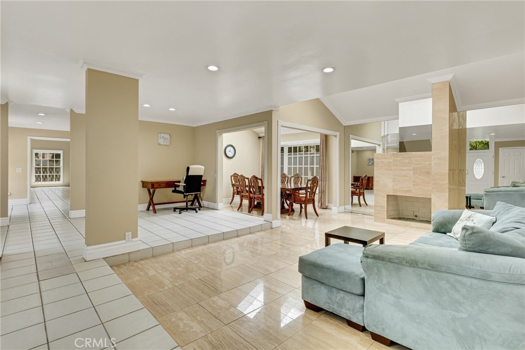 12 Oakdale Irvine, CA 92604 - Photo 6 of 53 a living room with furniture and a glass door