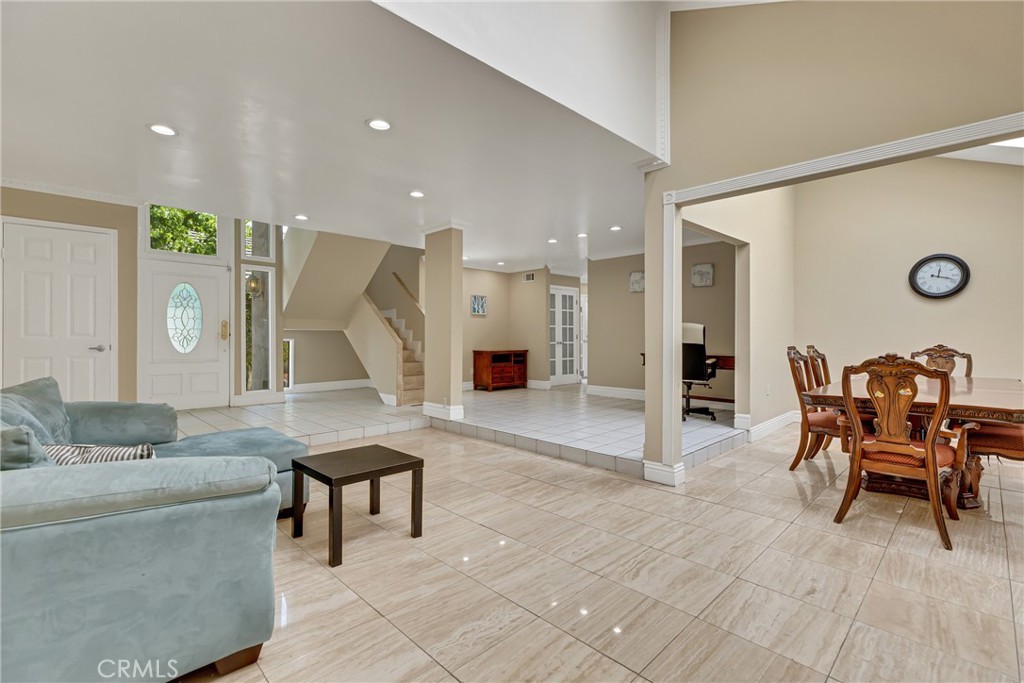 12 Oakdale Irvine, CA 92604 - Photo 10 of 53 a living room with furniture and a wooden floor