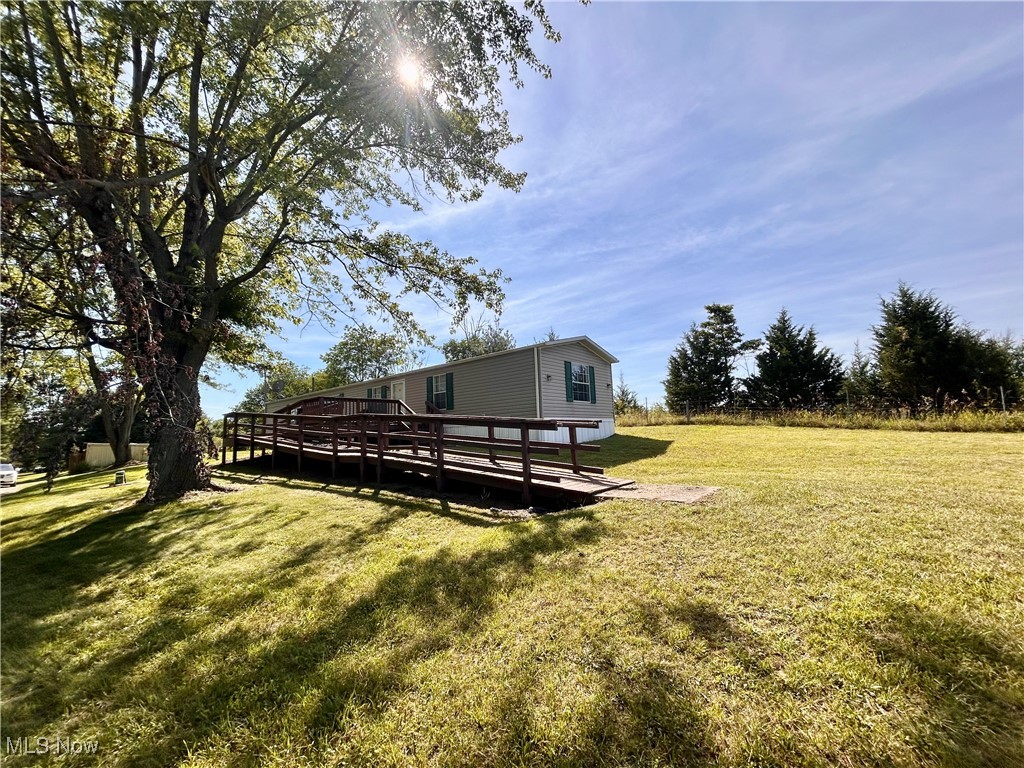 84550 Snyder Road Jewett, OH 43986 - Photo 19 of 21 View of green lawn featuring a deck