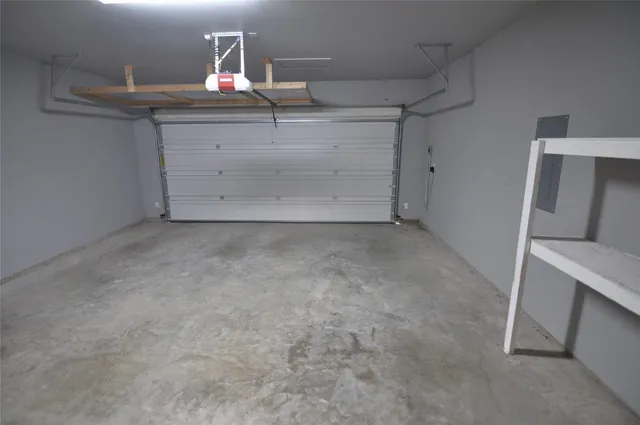 a white toilet sitting next to a small sink