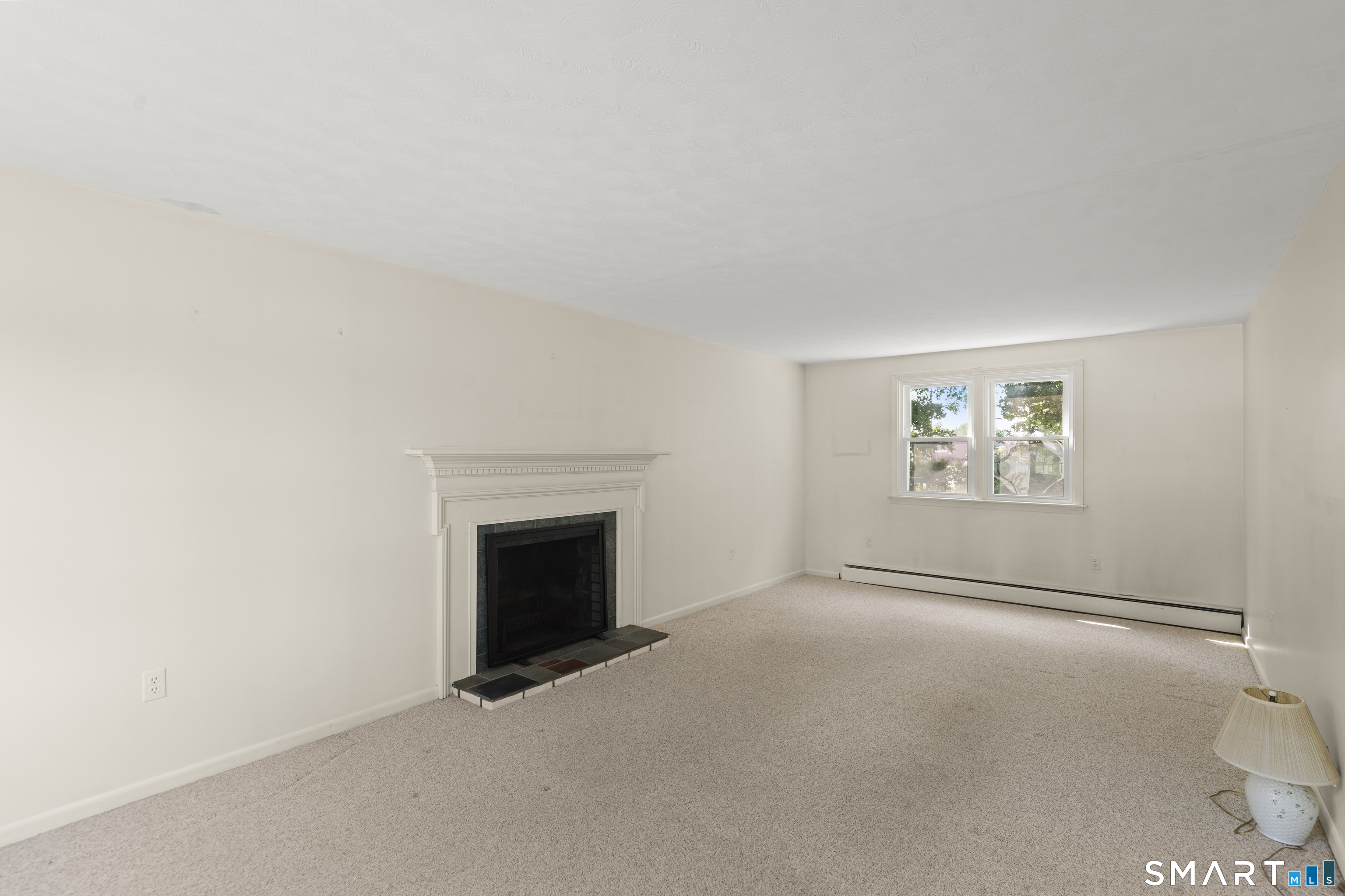 2 Sparkle Street Enfield, CT 06082 - Photo 13 of 32 Living room with fireplace