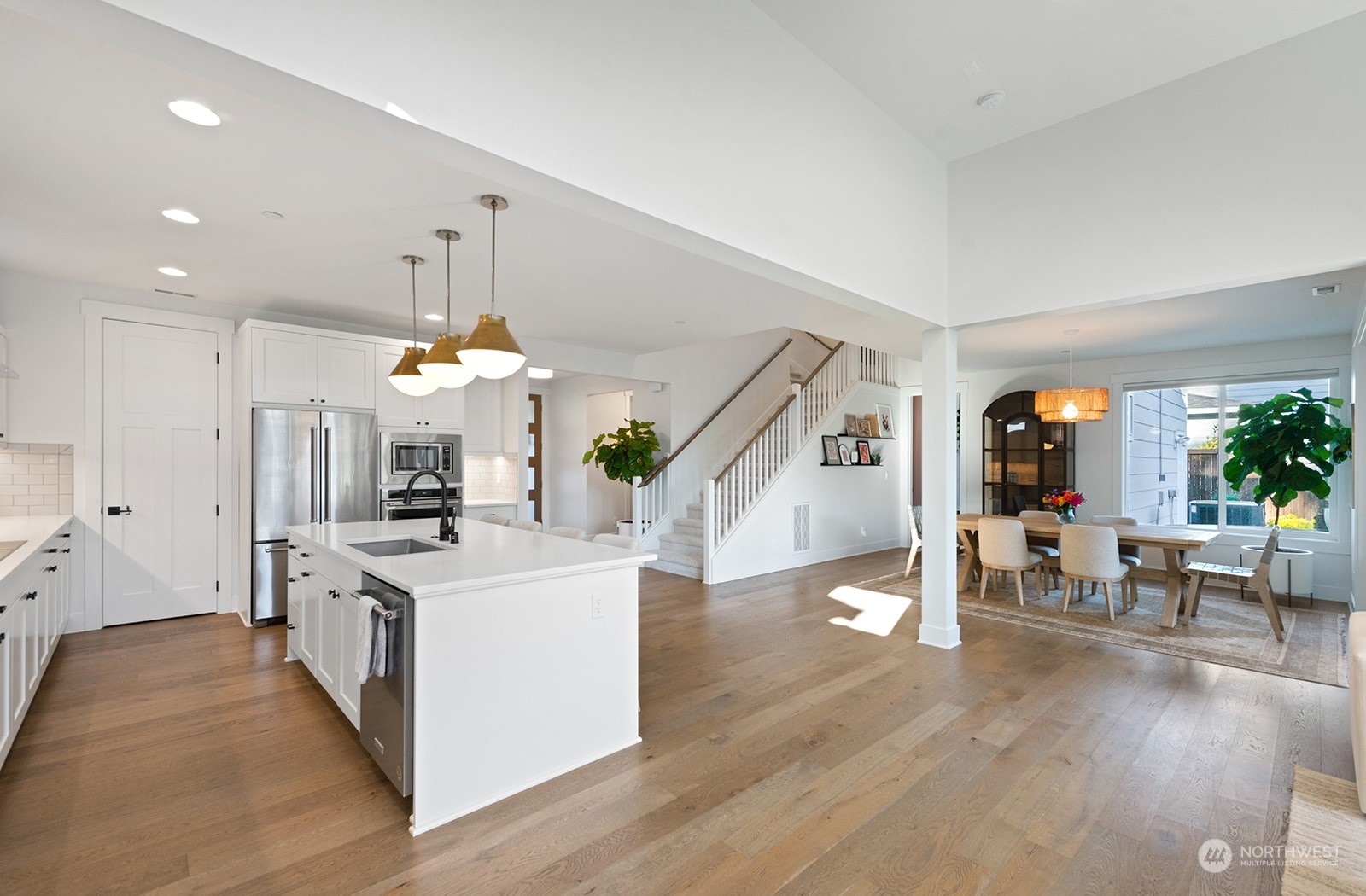 23932 104th Avenue West Edmonds, WA 98020 - Photo 14 of 39 a large kitchen with a table and chairs