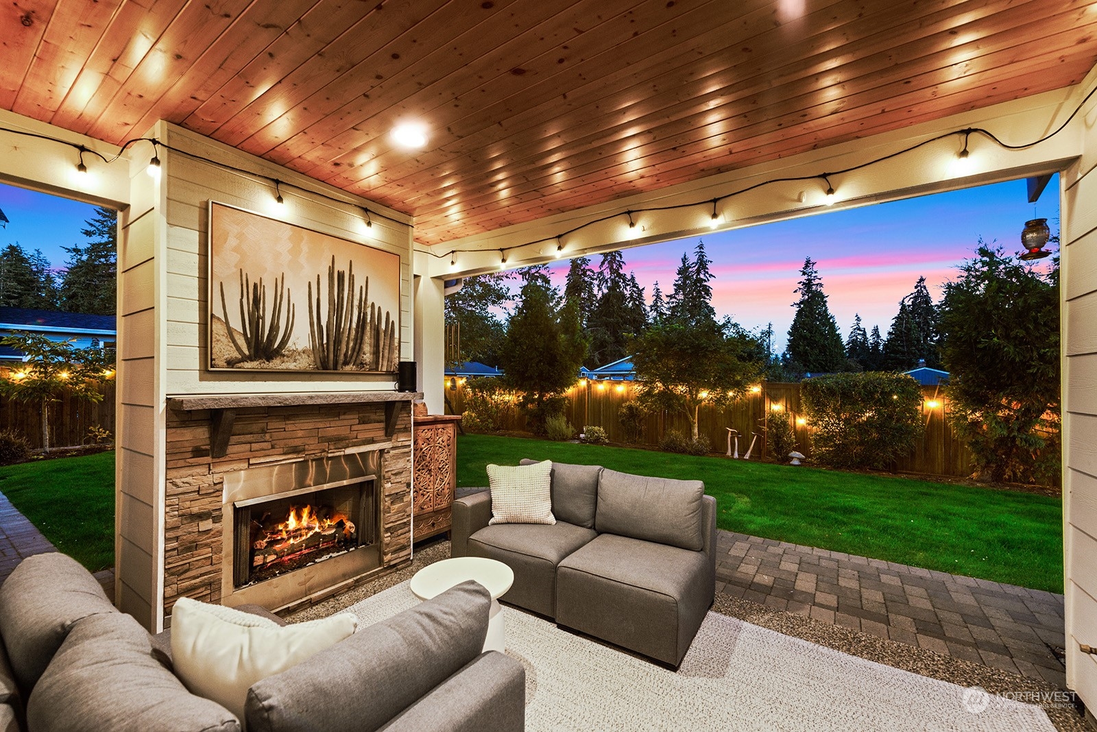 23932 104th Avenue West Edmonds, WA 98020 - Photo 19 of 39 a outdoor living space with furniture and a fireplace
