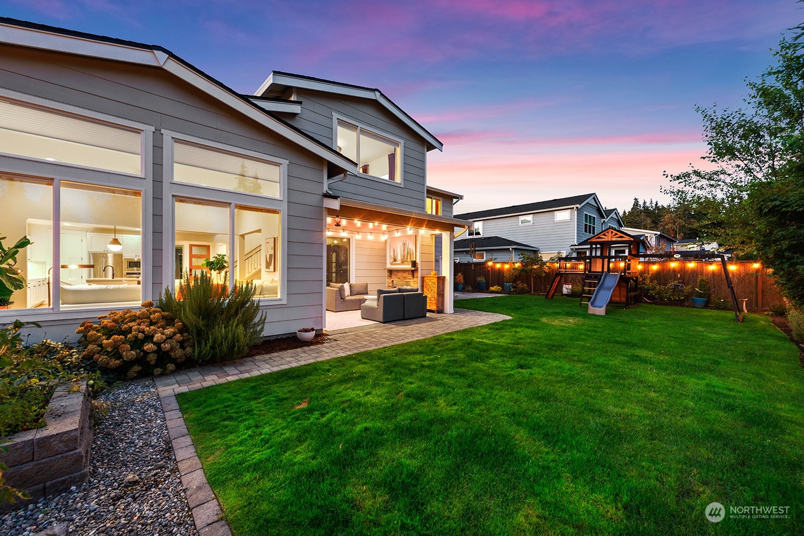 23932 104th Avenue West Edmonds, WA 98020 - Photo 21 of 39 a front view of a house with swing and a slide