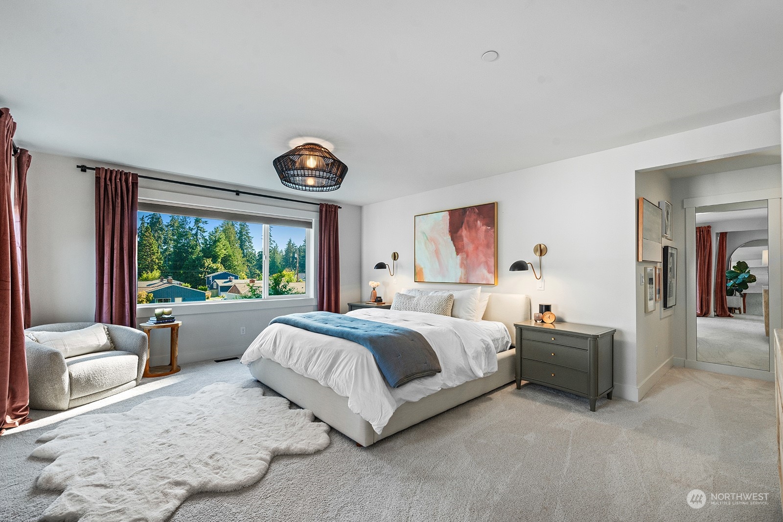 23932 104th Avenue West Edmonds, WA 98020 - Photo 32 of 39 a bedroom with a large bed and a large window