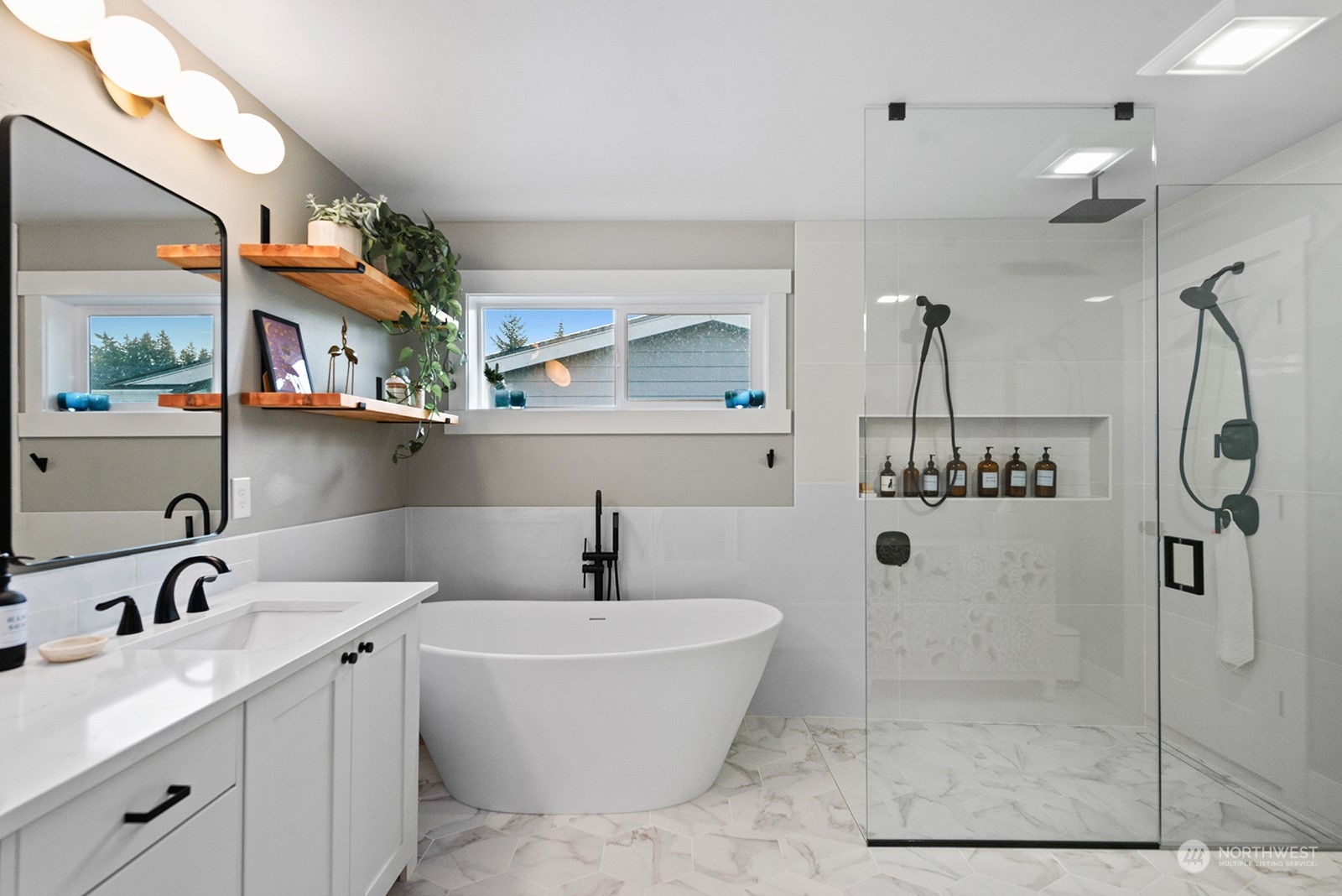 23932 104th Avenue West Edmonds, WA 98020 - Photo 34 of 39 a bathroom with a bathtub and a shower