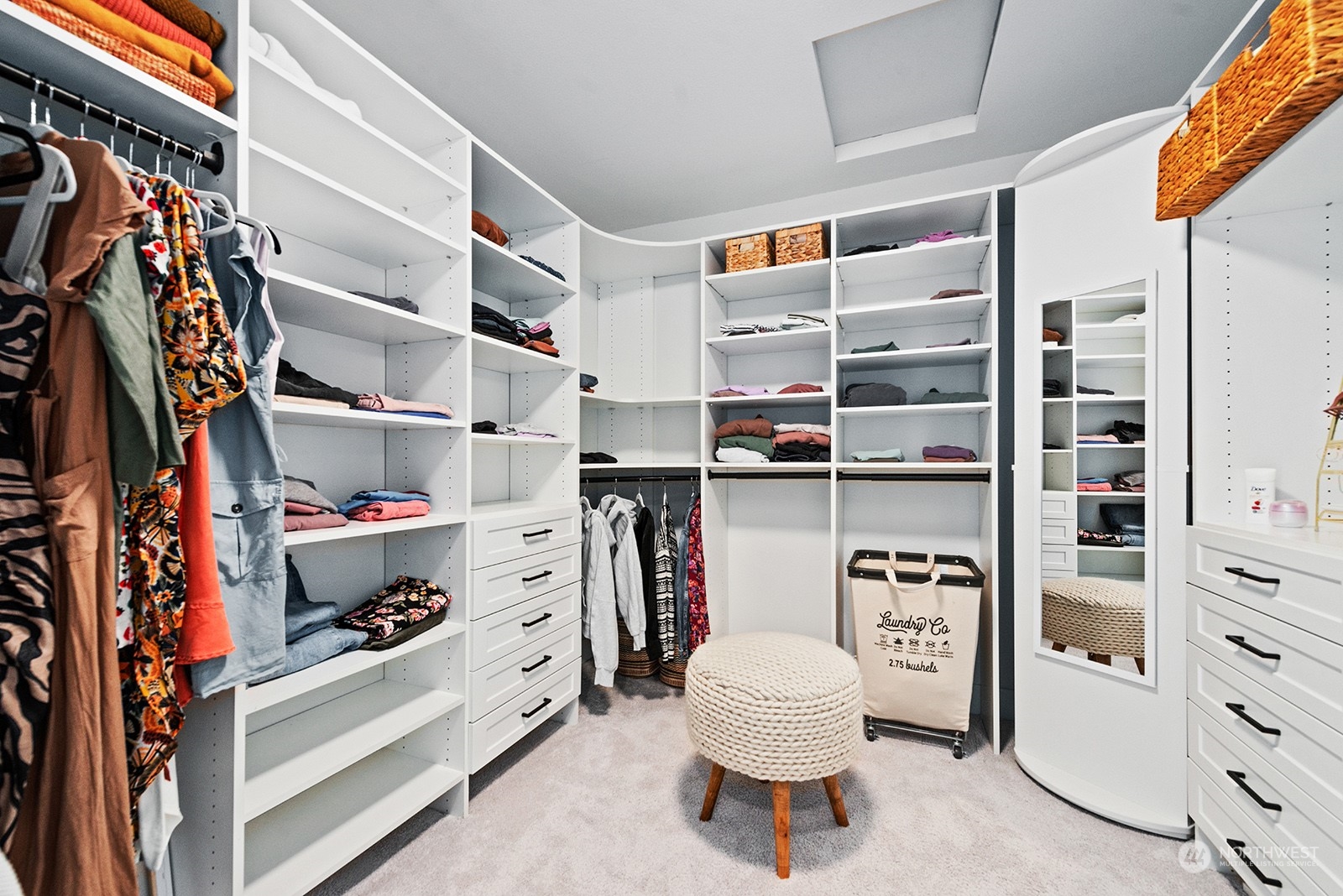 23932 104th Avenue West Edmonds, WA 98020 - Photo 35 of 39 a view of walk in closet with clothes and shoes