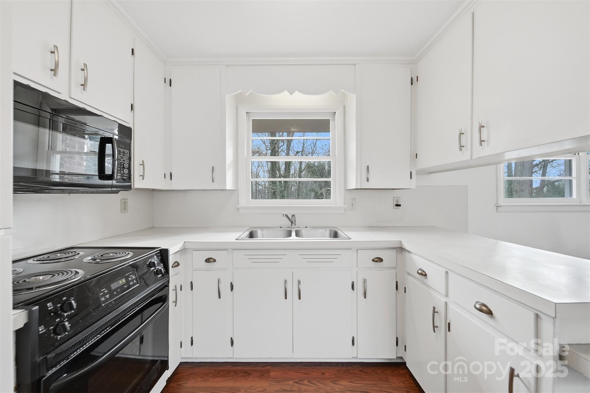 1922 30th Street Northeast Hickory, NC 28601 - Photo 11 of 30 a kitchen with appliances cabinets and a sink