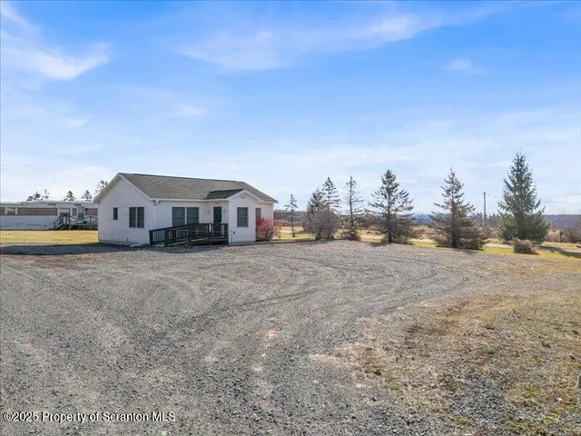 a car parked in front of a house