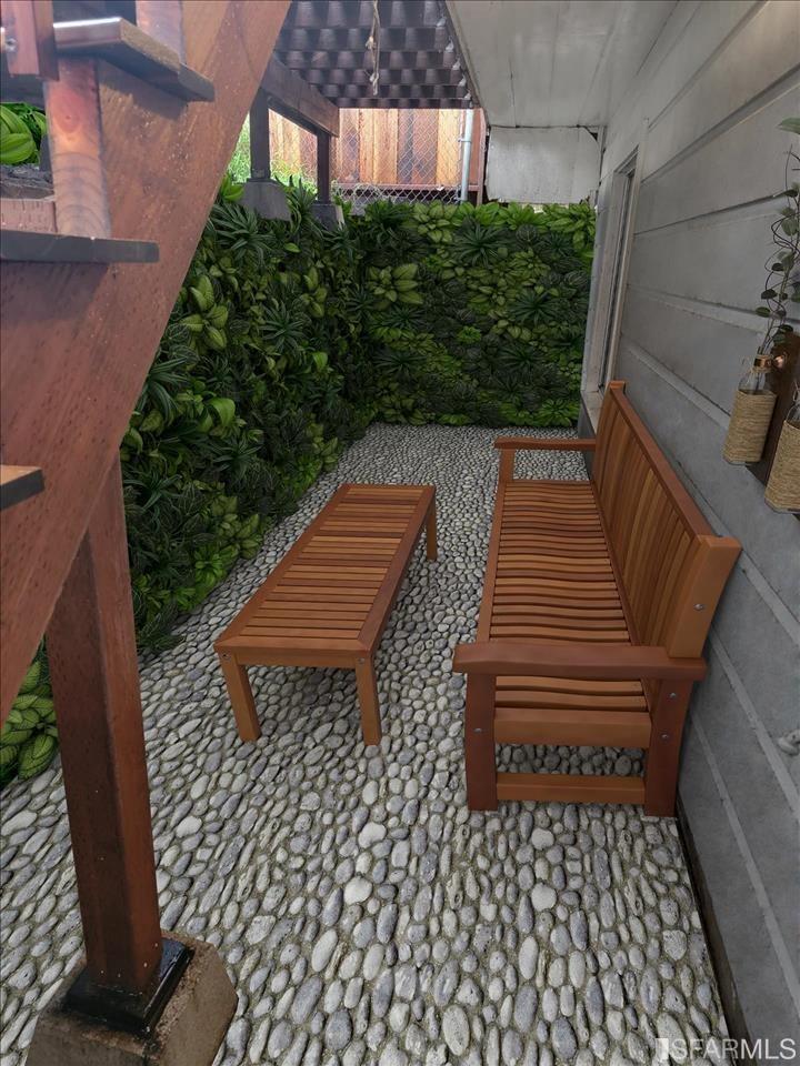 Possible look of small backyard patio for downstairs bonus room