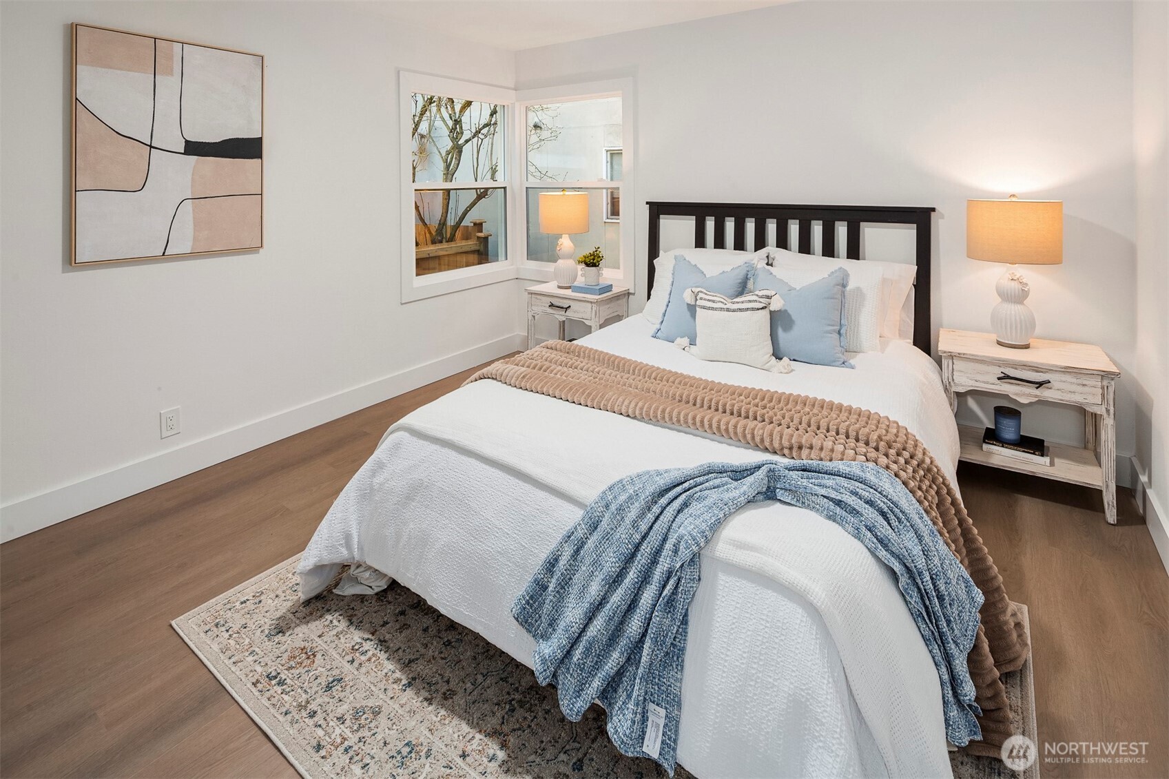 1016 Northwest 85th Street Seattle, WA 98117 - Photo 12 of 36 a bedroom with bed and window