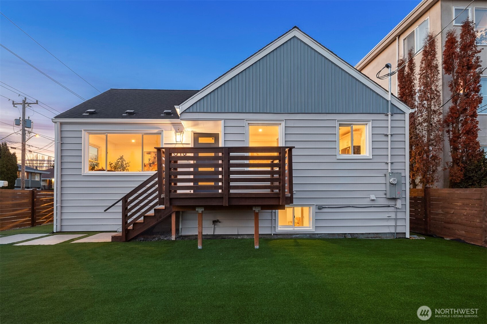 1016 Northwest 85th Street Seattle, WA 98117 - Photo 2 of 36 a front view of a house with a yard