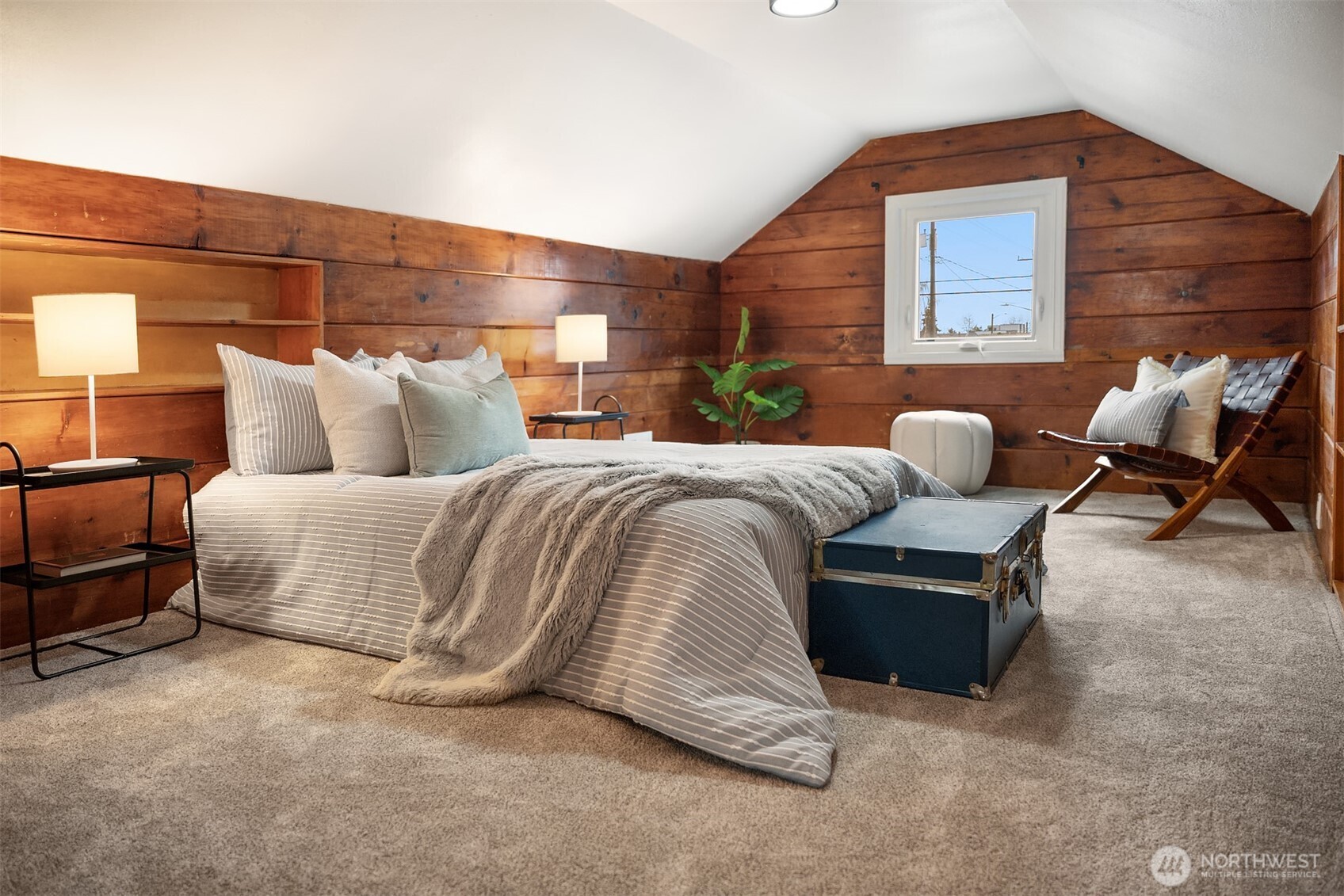 1016 Northwest 85th Street Seattle, WA 98117 - Photo 25 of 36 a bedroom with bed couch and window