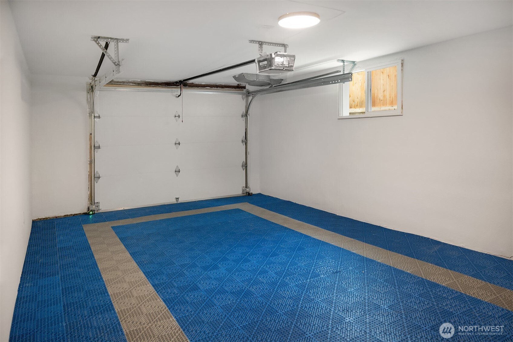 1016 Northwest 85th Street Seattle, WA 98117 - Photo 26 of 36 a very nice looking room with a rug