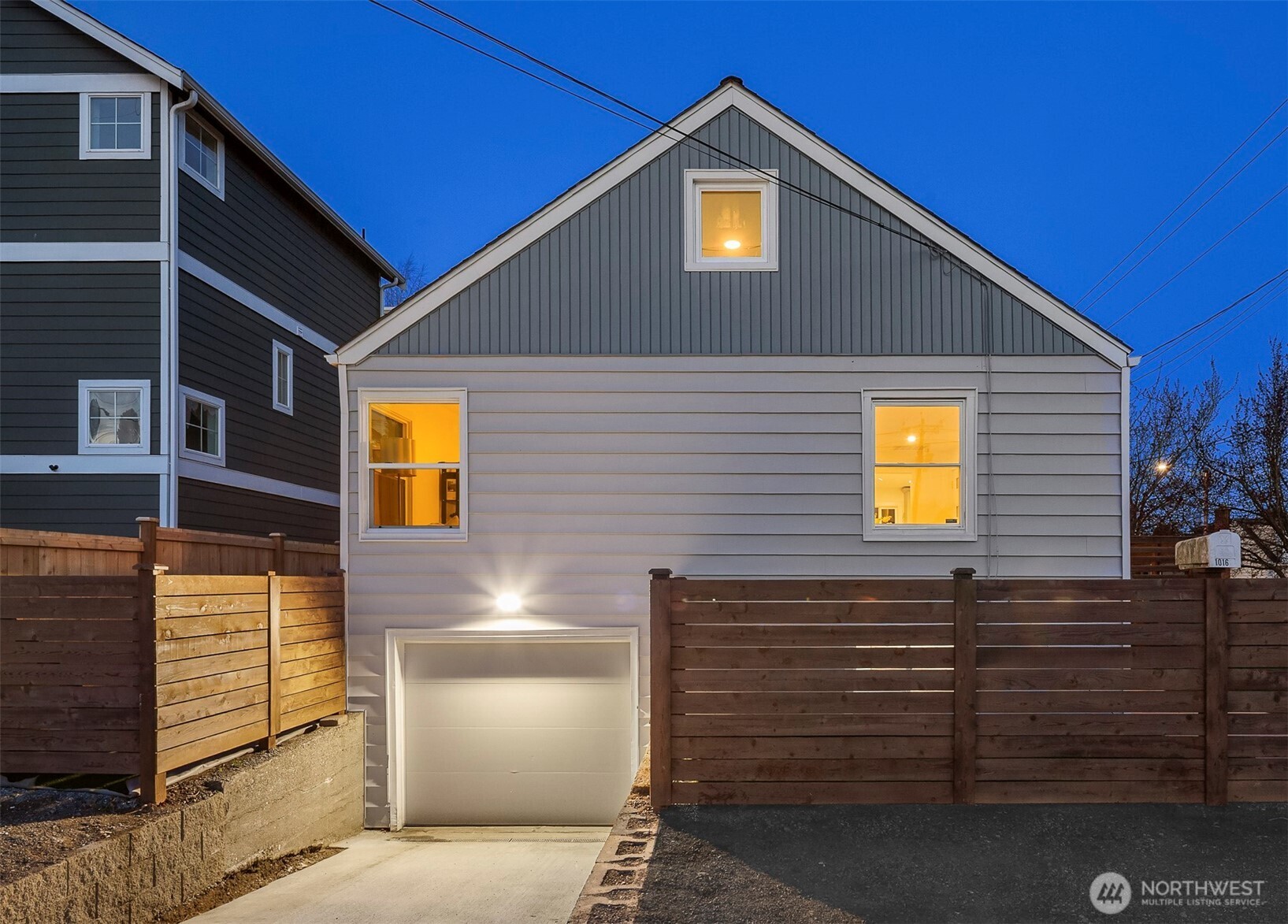 1016 Northwest 85th Street Seattle, WA 98117 - Photo 28 of 36 a view of a house with a garage