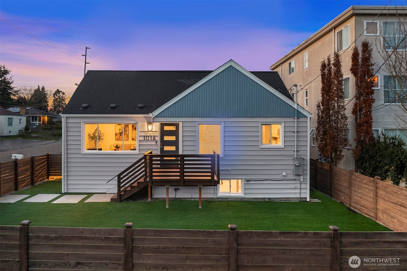 1016 Northwest 85th Street Seattle, WA 98117 - Photo 30 of 36 a front view of a house with a yard
