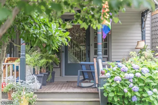 a house with a tree in front