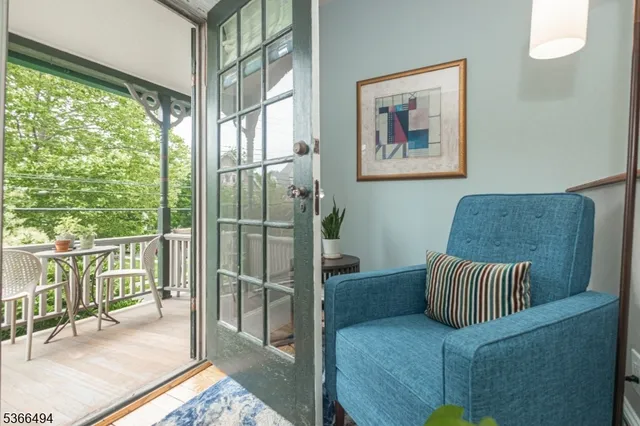 a view of a balcony with chairs