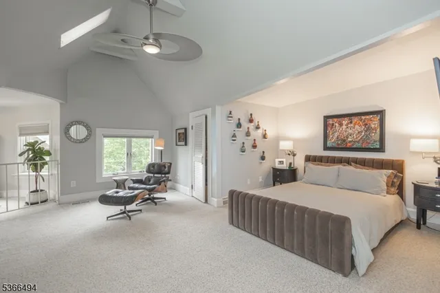 a view of a workspace with furniture and a kitchen