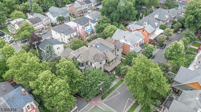 an aerial view of a house with mountain view