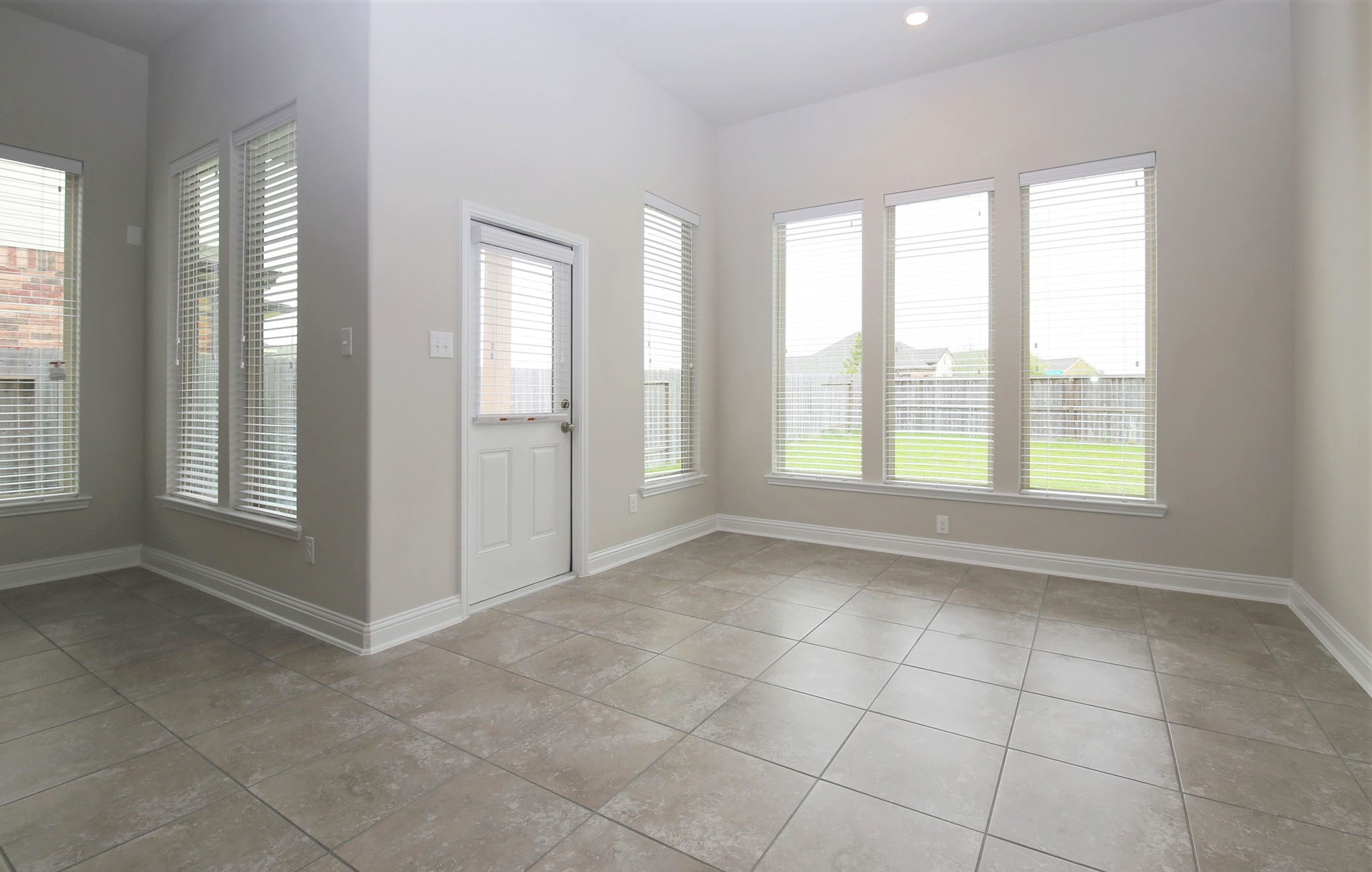 8218 Oxbow Manor Lane Cypress, TX 77433 - Photo 11 of 37 a view of an empty room with a window
