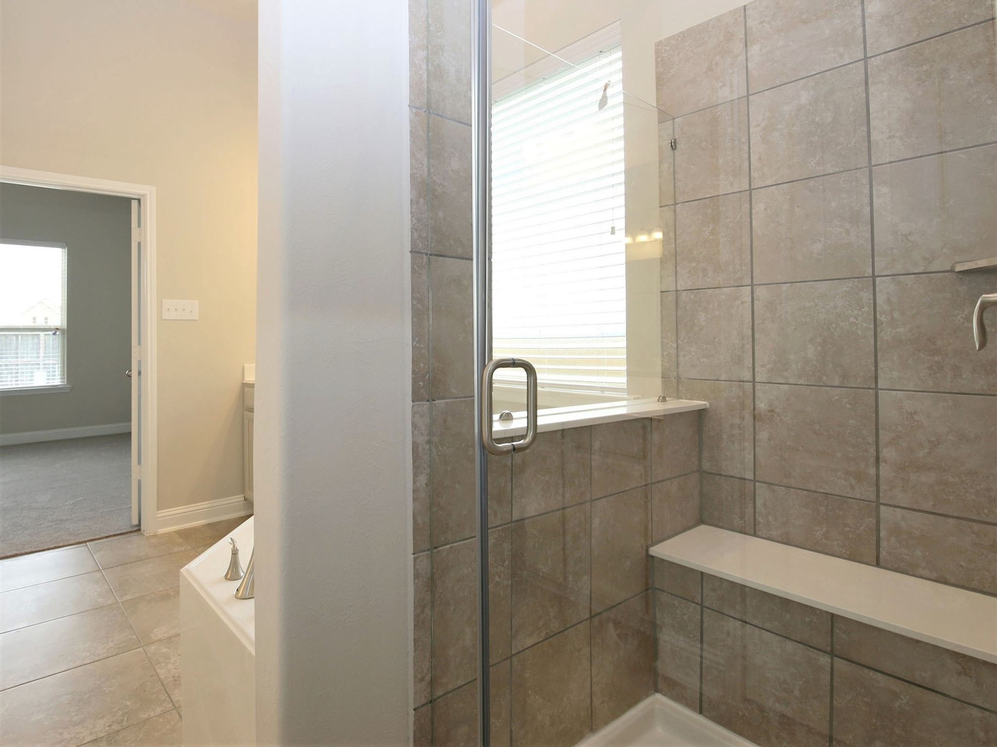 8218 Oxbow Manor Lane Cypress, TX 77433 - Photo 17 of 37 a bathroom with a shower
