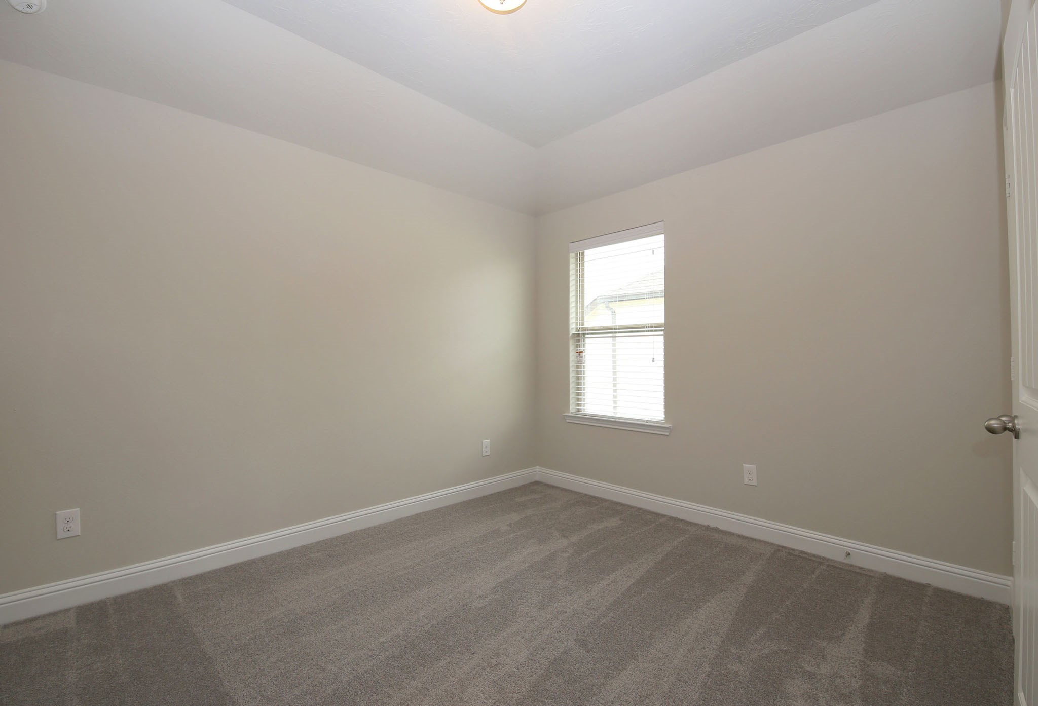 8218 Oxbow Manor Lane Cypress, TX 77433 - Photo 22 of 37 an empty room with a window