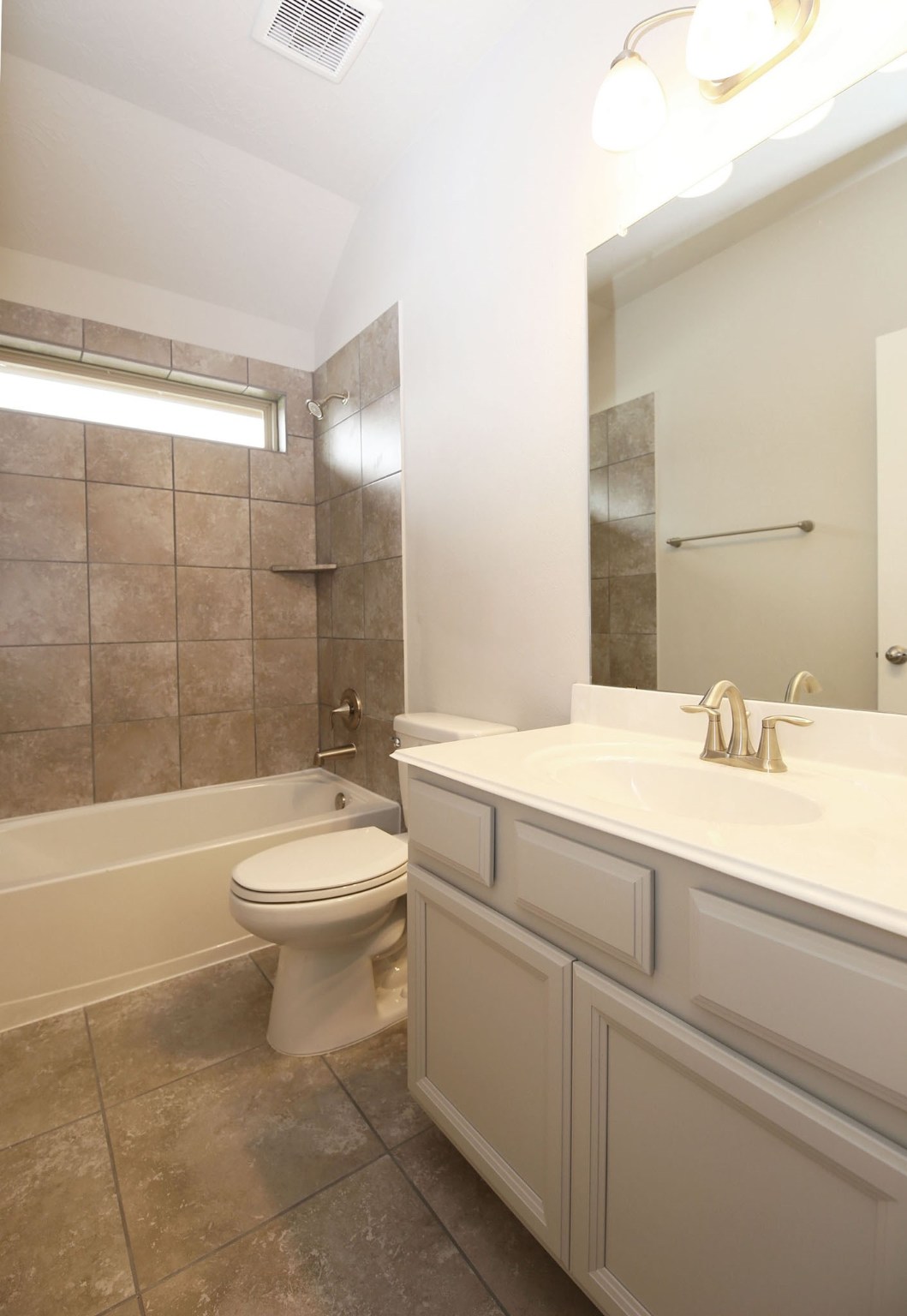 8218 Oxbow Manor Lane Cypress, TX 77433 - Photo 25 of 37 a bathroom with a sink a toilet and shower