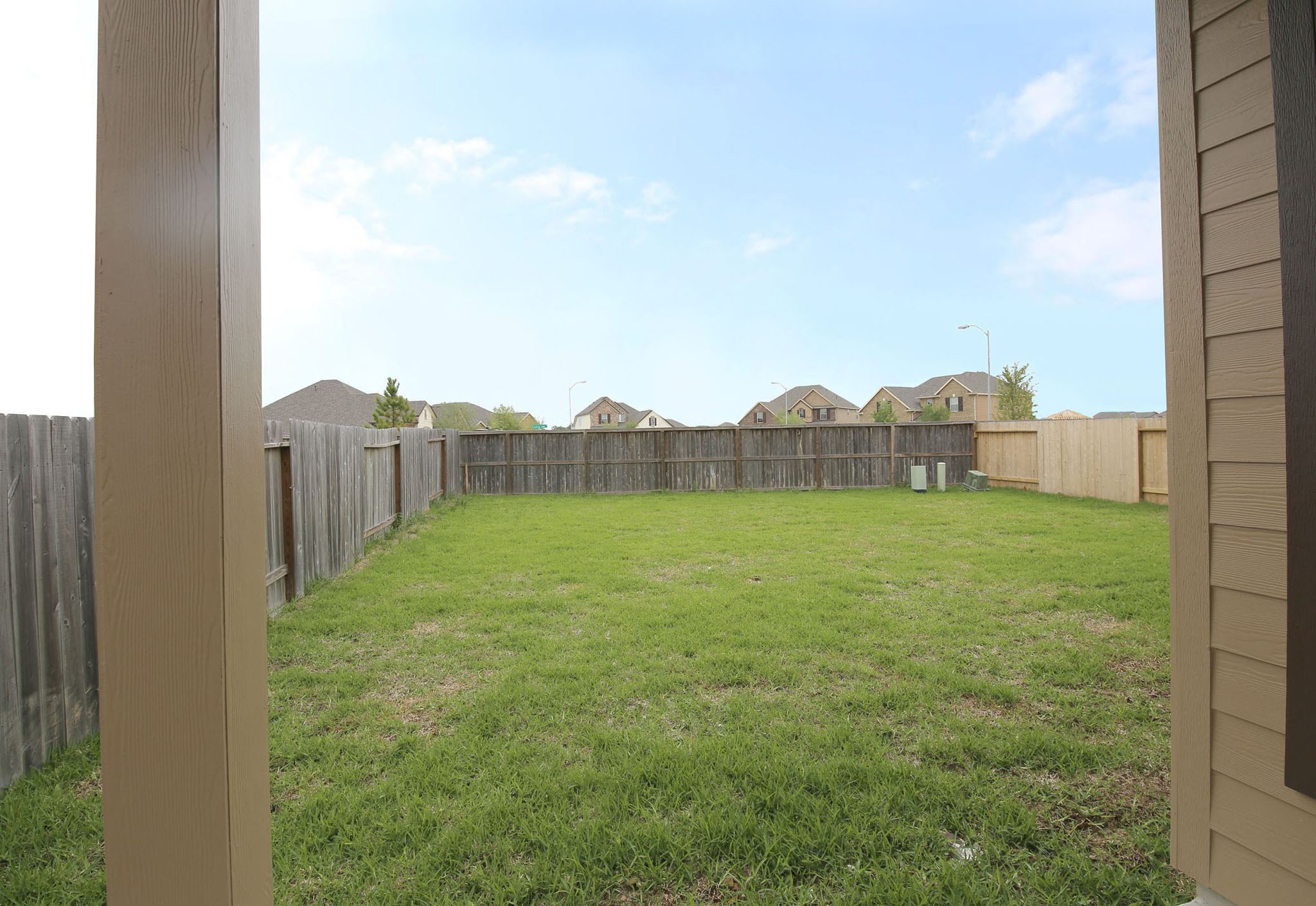 8218 Oxbow Manor Lane Cypress, TX 77433 - Photo 35 of 37 a view of a house with backyard